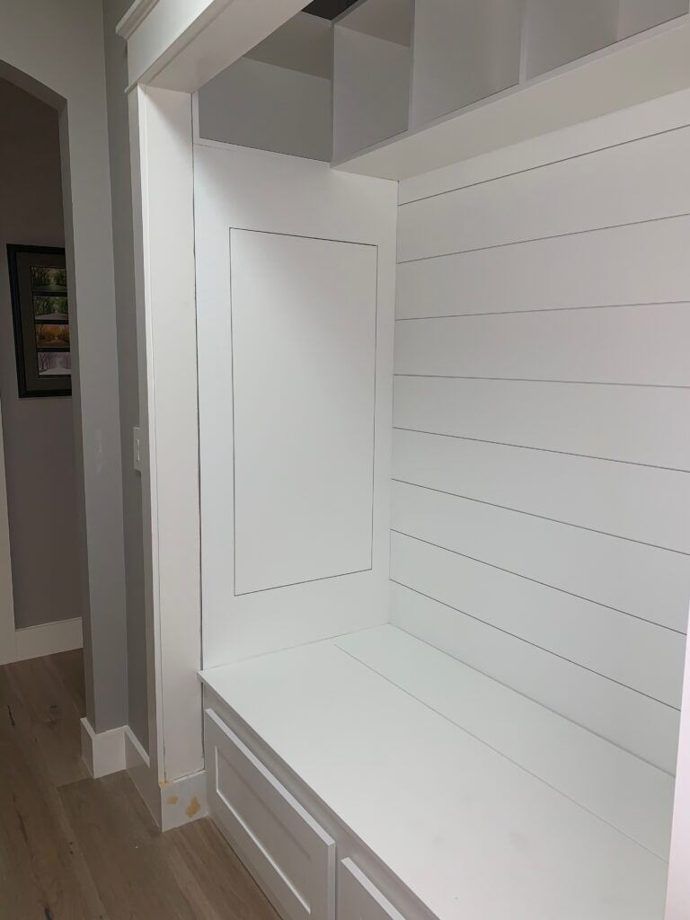 Built-in drop zone with drawers and room for bins above.