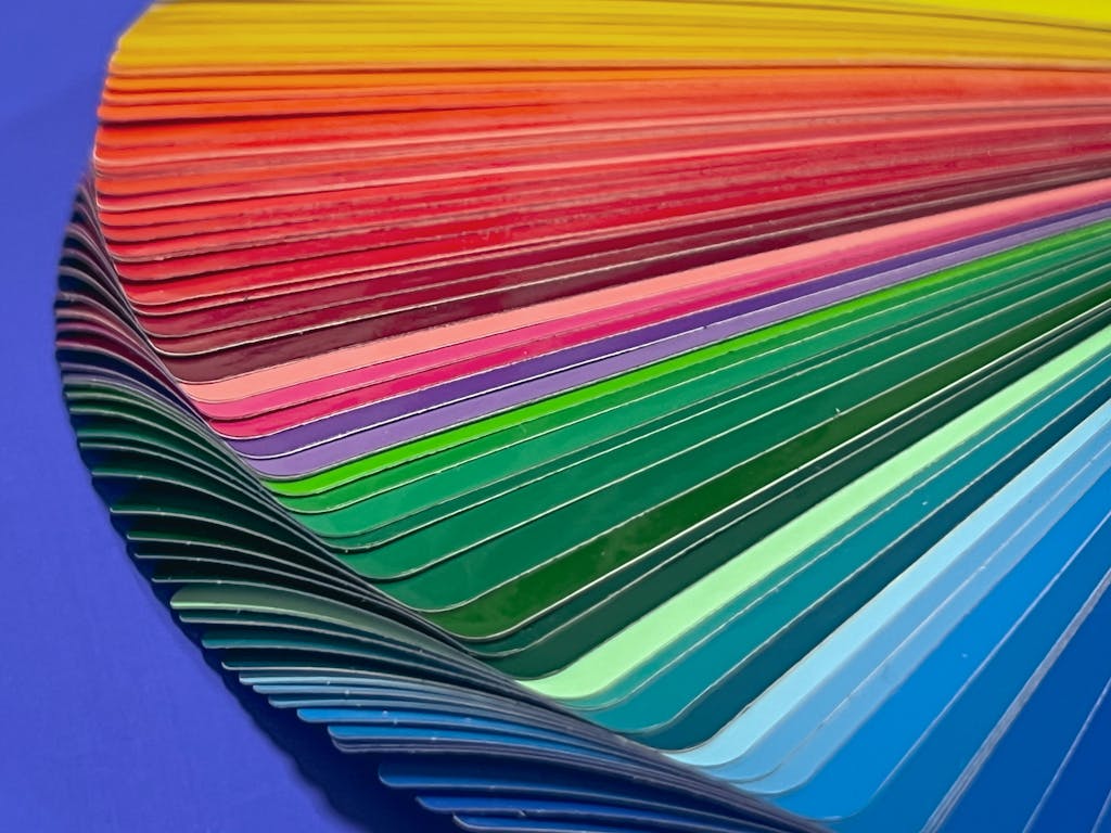 Close-up of vibrant color swatches arranged in a creative and artistic display.