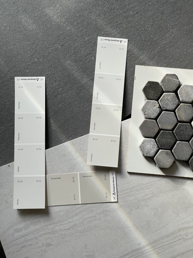 Natural materials for tile along with neutral paint chips for a primary bathroom remodel in St Augustine FL.